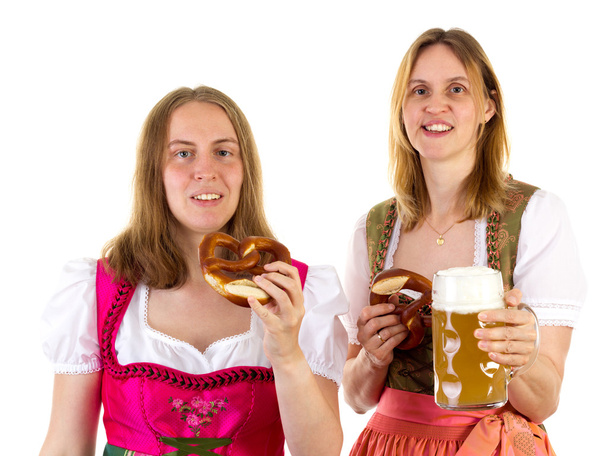 Comer pretzel y beber cerveza en el Oktoberfest
 - Foto, imagen