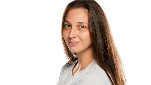 Portrait of young smiling woman without makeup on white background - Photo, Image