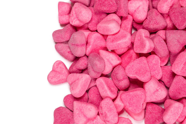 Assorted tasty gummy candies. Top view. Pink jelly sweets background.  - Photo, Image