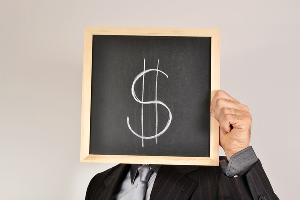 Businessman with dollar blackboard - Photo, Image