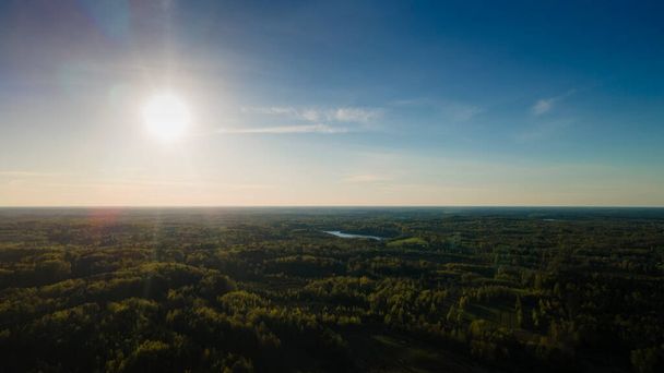 High altitude aerial view of the sun and clear blue sky. Beautiful nature background. - Foto, Imagem