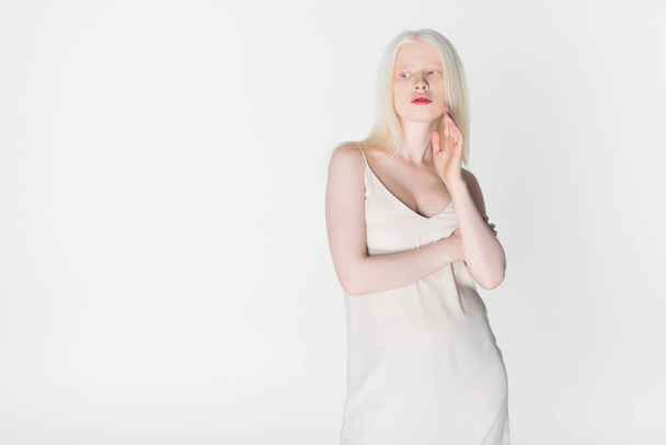Trendy albino woman looking away isolated on white  - Фото, зображення