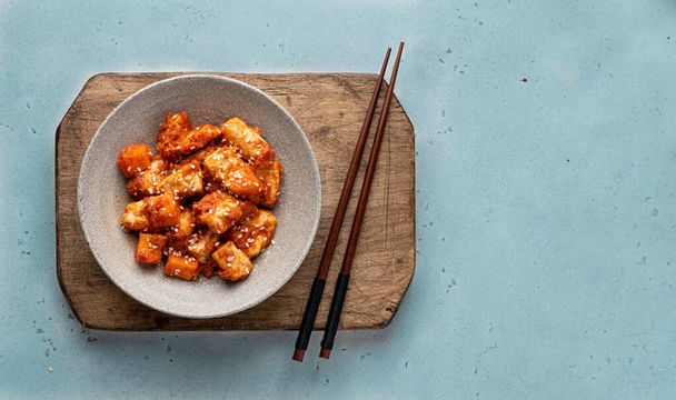 Sweet and Sour Chicken in a ceramic bowl  - Photo, image