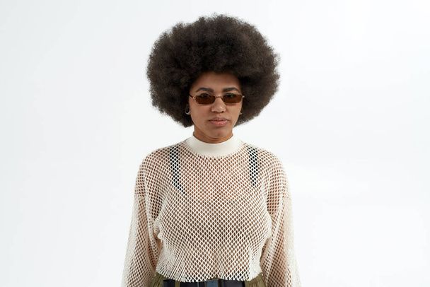 Young curly serious black woman in glasses - Photo, Image