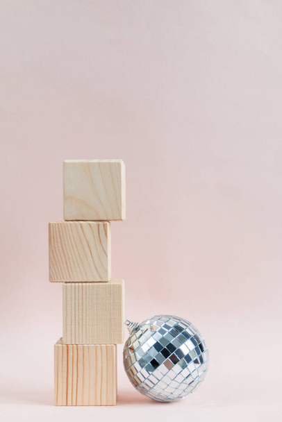 wooden cubes against pink background, empty space for text - Photo, Image