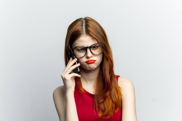 pretty woman with glasses talking on the phone technology lifestyle - Foto, Imagem