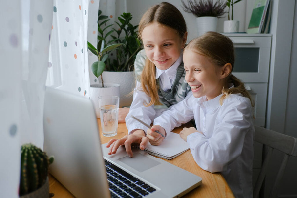 Two girls, sisters study at home, distance learning - Valokuva, kuva