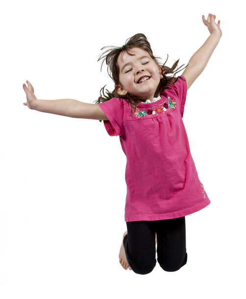 Happy little girl jumping in air - Foto, imagen