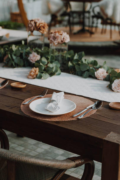 close-up plate and napkin decoration on beautiful dining table - Fotoğraf, Görsel