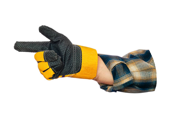 Χέρι του κατασκευαστή ή εργολάβος σε προστατευτικό γάντι είναι μονωμένο σε λευκό φόντο. Δείκτης δείχνει προς τα πλάγια. - Φωτογραφία, εικόνα