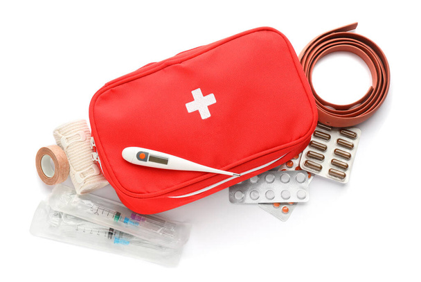 First aid kit on white background, top view. Health care - Φωτογραφία, εικόνα