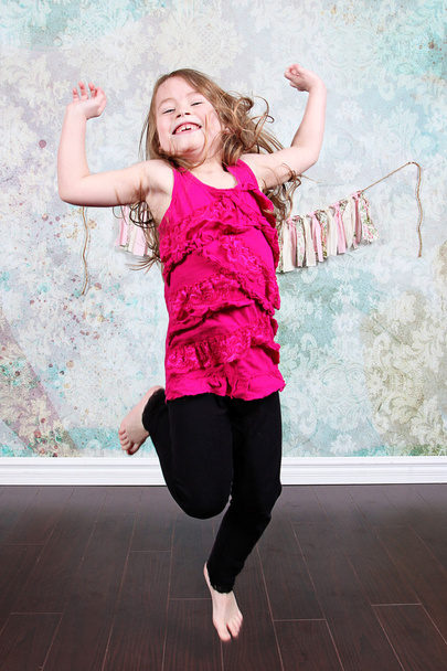 Little Girl jumping in Studio - Foto, Imagem