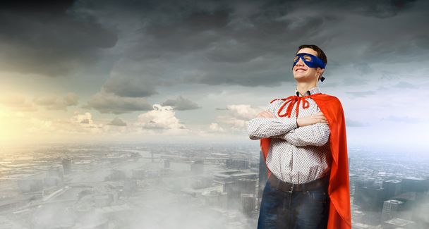 Человек в маске супермена и плаще
 - Фото, изображение