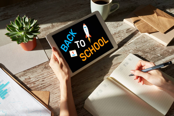 Back to school text on screen. Education and e-learning concept. - Foto, Imagem