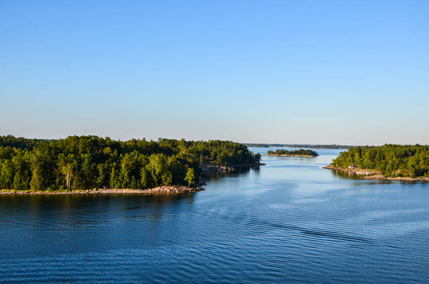 Dwellings islands on Stockholm archipelago in Baltic sea at sunny morning, Sweden - Photo, image