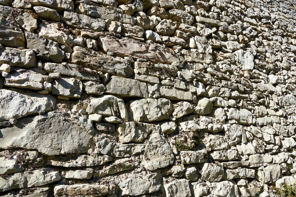 old stone wall made by hand - Photo, Image