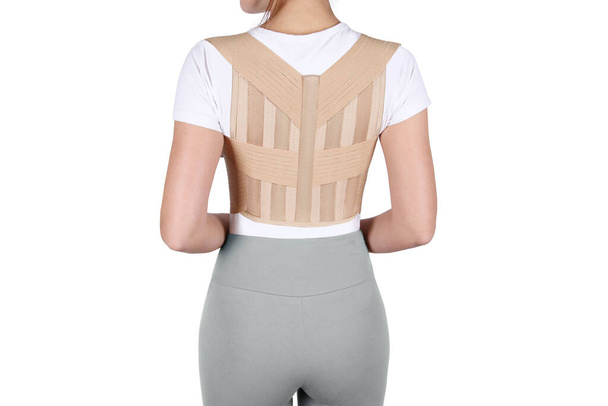 Posture Corrector isolated on white. Orthopedic lumbar support products. Lumbar Support Belts For Back Clavicle Spine. Lumbar Waist Support Belt Strong Lower Back Brace Support. Lumbar brace - Photo, image