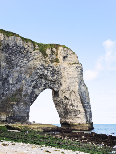 rock with arch on english channel beach - Photo, Image