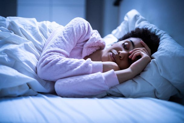 Awake African American Woman In Bed With Insomnia. Sleep Nightmare - Φωτογραφία, εικόνα