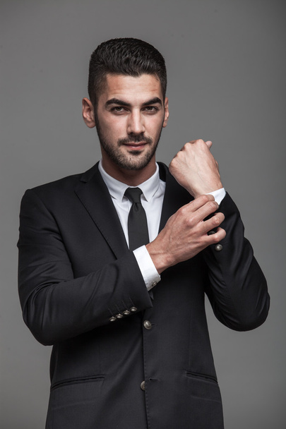 handsome elegant man on grey background - Φωτογραφία, εικόνα