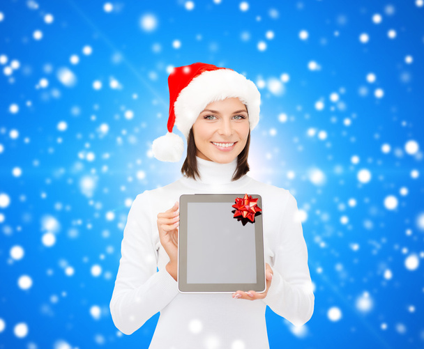 woman in santa helper hat with tablet pc - Фото, изображение