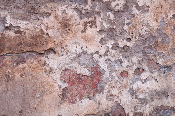Texture of old wall covered with yellow stucco - Fotoğraf, Görsel