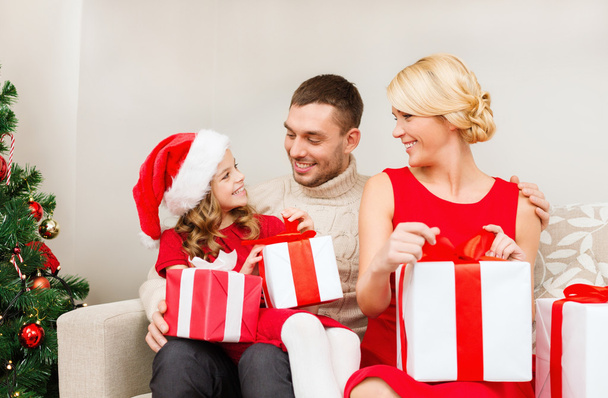 happy family opening gift boxes - 写真・画像