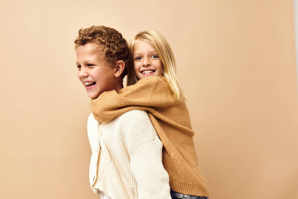 brother and sister friendship rides on the back childhood Studio Lifestyle - Foto, imagen