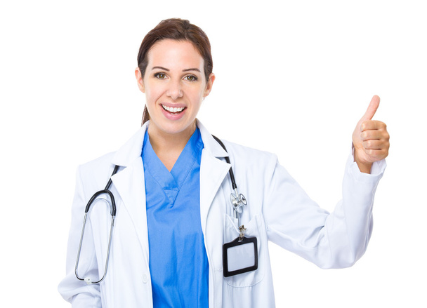 Médico femenino con pulgar hacia arriba
 - Foto, imagen