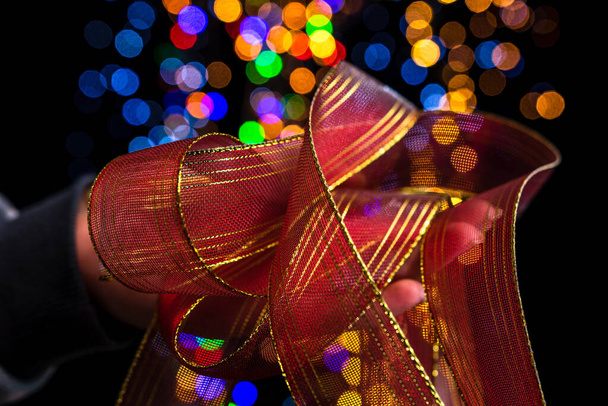 A Christmas decoration and ornament on the Christmas tree bokeh background - Foto, immagini