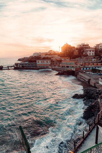 A stunning sunset over the sea in Liguria Italy - Фото, изображение