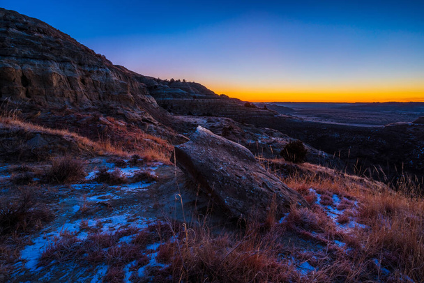 A scenic sunrise over trails of the Badlands in Theodore Roosevelt National Park, North Dakota - Valokuva, kuva
