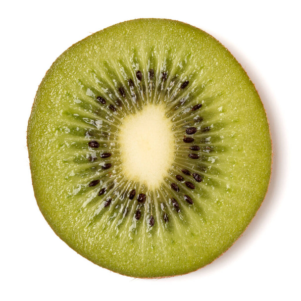 One kiwi fruit slice isolated on white background closeup. Kiwifruit slice flatlay. Flat lay, top view. - Foto, Imagen