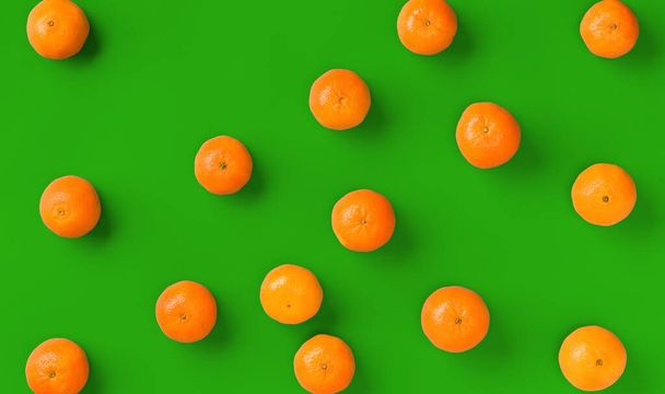 Fruit pattern of fresh orange tangerine or mandarin on green background. Flat lay, top view. Pop art design, creative summer concept. Citrus in minimal style. - 写真・画像