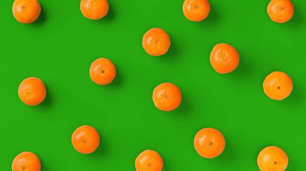 Fruit pattern of fresh orange tangerine or mandarin on green background. Flat lay, top view. Pop art design, creative summer concept. Citrus in minimal style. - Foto, imagen