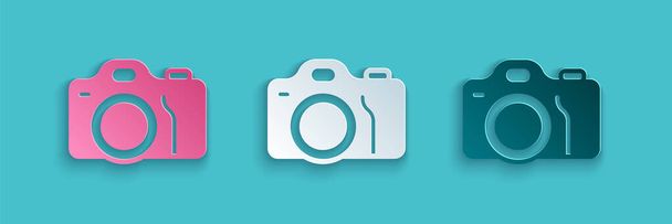 Papiergeschnittene Fotokamera-Ikone isoliert auf blauem Hintergrund. Fotokamera. Digitale Fotografie. Papierkunst. Vektor - Vektor, Bild