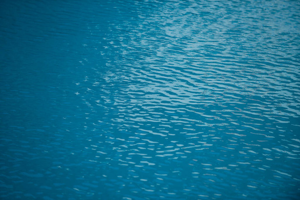 Background of water, surface blue swimming pool. - Foto, Imagem