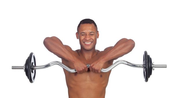 Красивий м'язистий чоловік тренується з гантелями
  - Фото, зображення