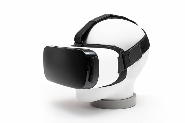 A close up of virtual glasses on a white head isolated on a white background - Photo, image