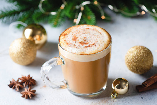 Cappuccino with cinnamon hot Christmas drink. Festive New Year holidays drink - Photo, Image