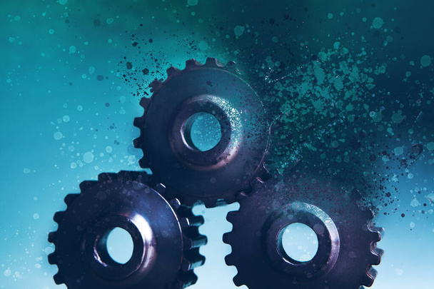 gears disappear on a blue background - Photo, Image