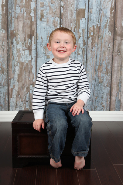 Cute little boy posing in studio - Фото, изображение