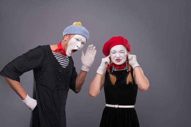 Portrait of funny mime couple with white faces and emotions isol - Фото, изображение