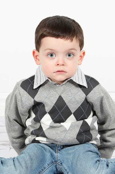 Little boy posing in studio - Фото, изображение