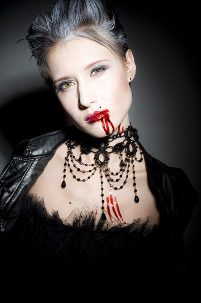 Sexy woman in blood - Фото, изображение