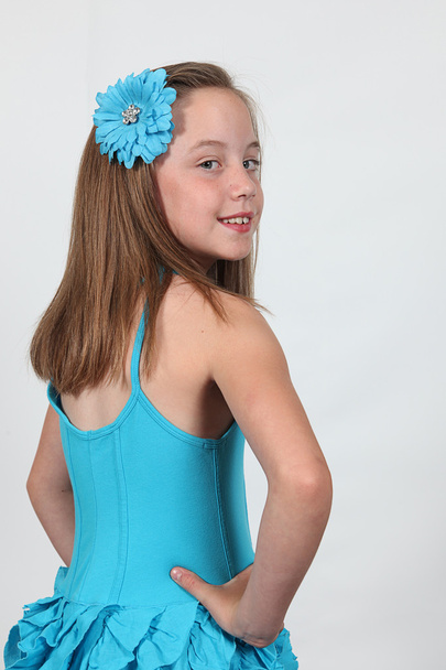 Little Girl wearing dress in Studio - Foto, imagen