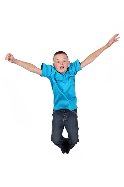 Young boy jumping in air - Zdjęcie, obraz