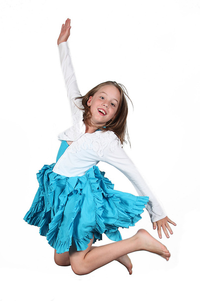 Beautiful young girl jumping - 写真・画像