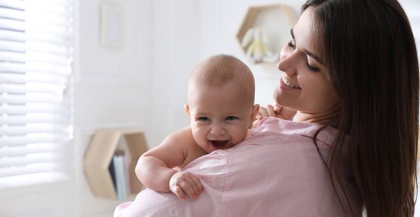 Mother with her cute baby at home. Banner design  - Foto, afbeelding