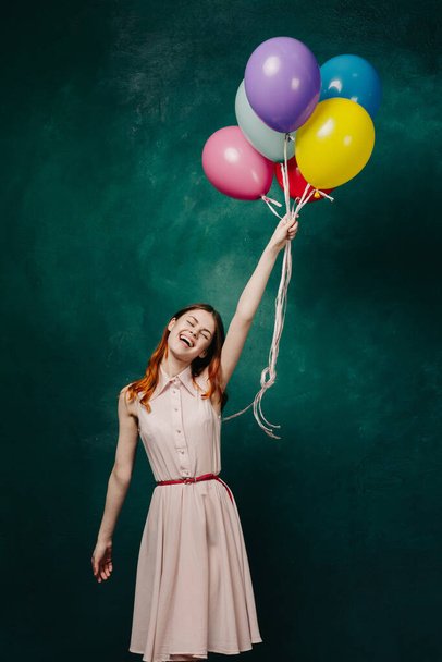 cheerful woman with colorful balloons birthday fun - Фото, зображення